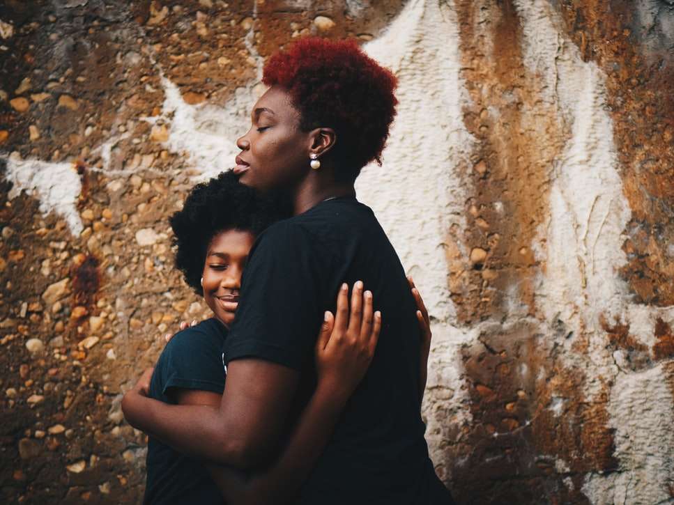 mother embrace daughter